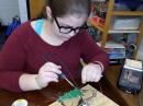 Annie soldering a LED Tree